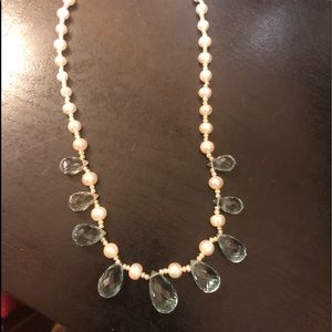 14 kPearl necklace with faceted blue topaz